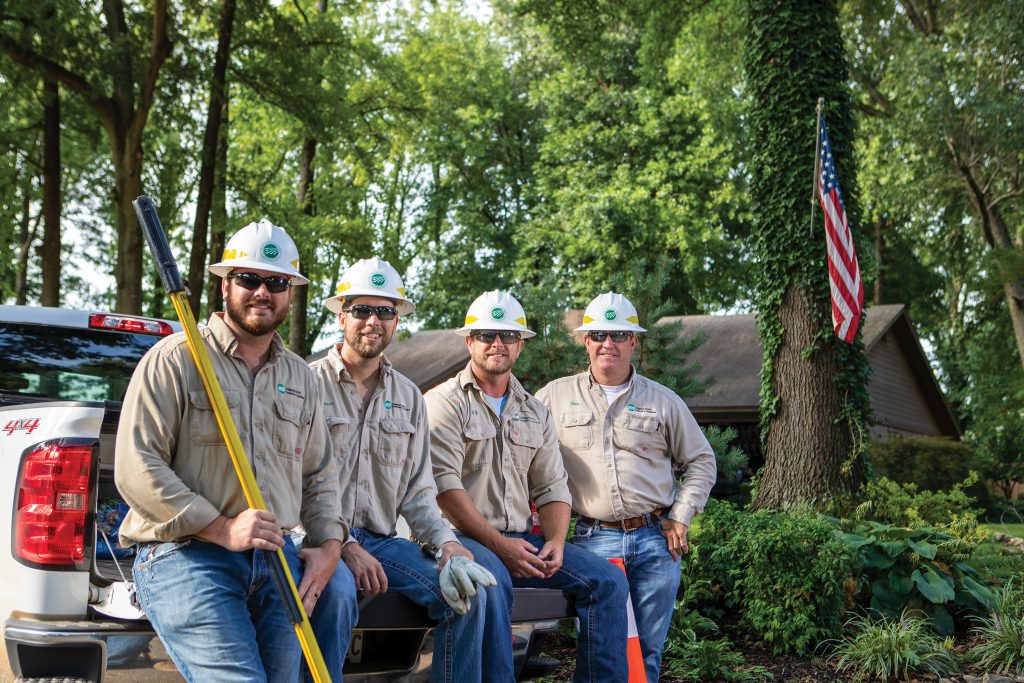 Lineman on Truck Tailgate